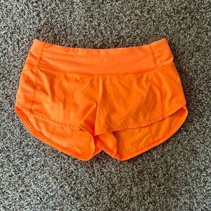 Orange Lululemon speed up shorts
